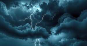 A dramatic stormy sky filled with dark clouds and lightning illuminating the horizon over a rural landscape.
