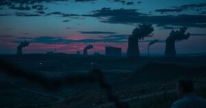 A dramatic scene of a northern landscape at twilight, highlighting nuclear silhouettes in a moody color palette.
