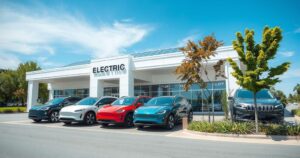 Electric vehicle dealership with modern cars and lush greenery, highlighting eco-friendly transportation.