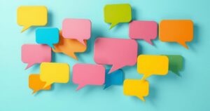 A vibrant discussion forum symbol featuring colorful chat bubbles and abstract patterns, reflecting collaboration.