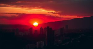 A sunset in Johannesburg with dark city shadows, symbolizing safety struggles for women against crime.