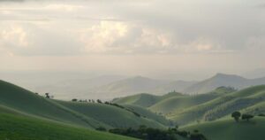 A serene landscape of the Kenyan Highlands under a grey sky, symbolizing loss and hope for peace.